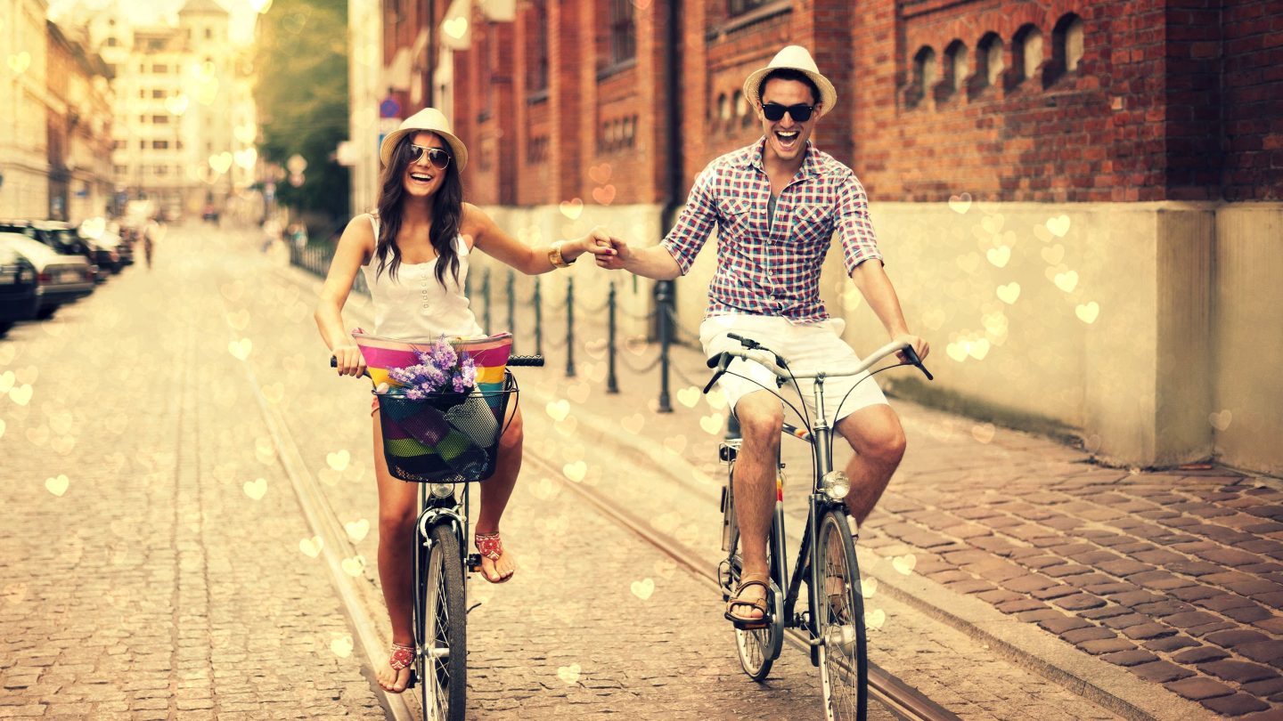 love-in-air-happy-couple-on-bicycles-wide-hd-wallpaper