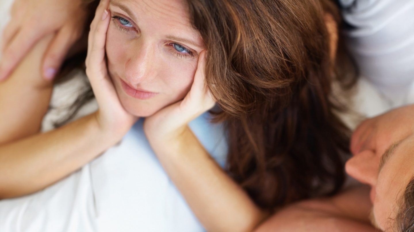 sad-woman-bed-110330